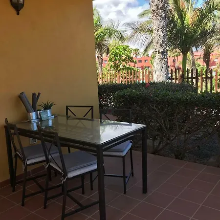 Tropical Garden Retreat: Private Terrace & Pool Oasis Apartment *