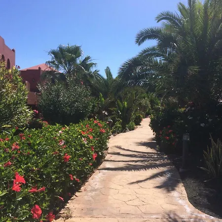 Tropical Garden Retreat: Private Terrace & Pool Oasis Apartment Corralejo